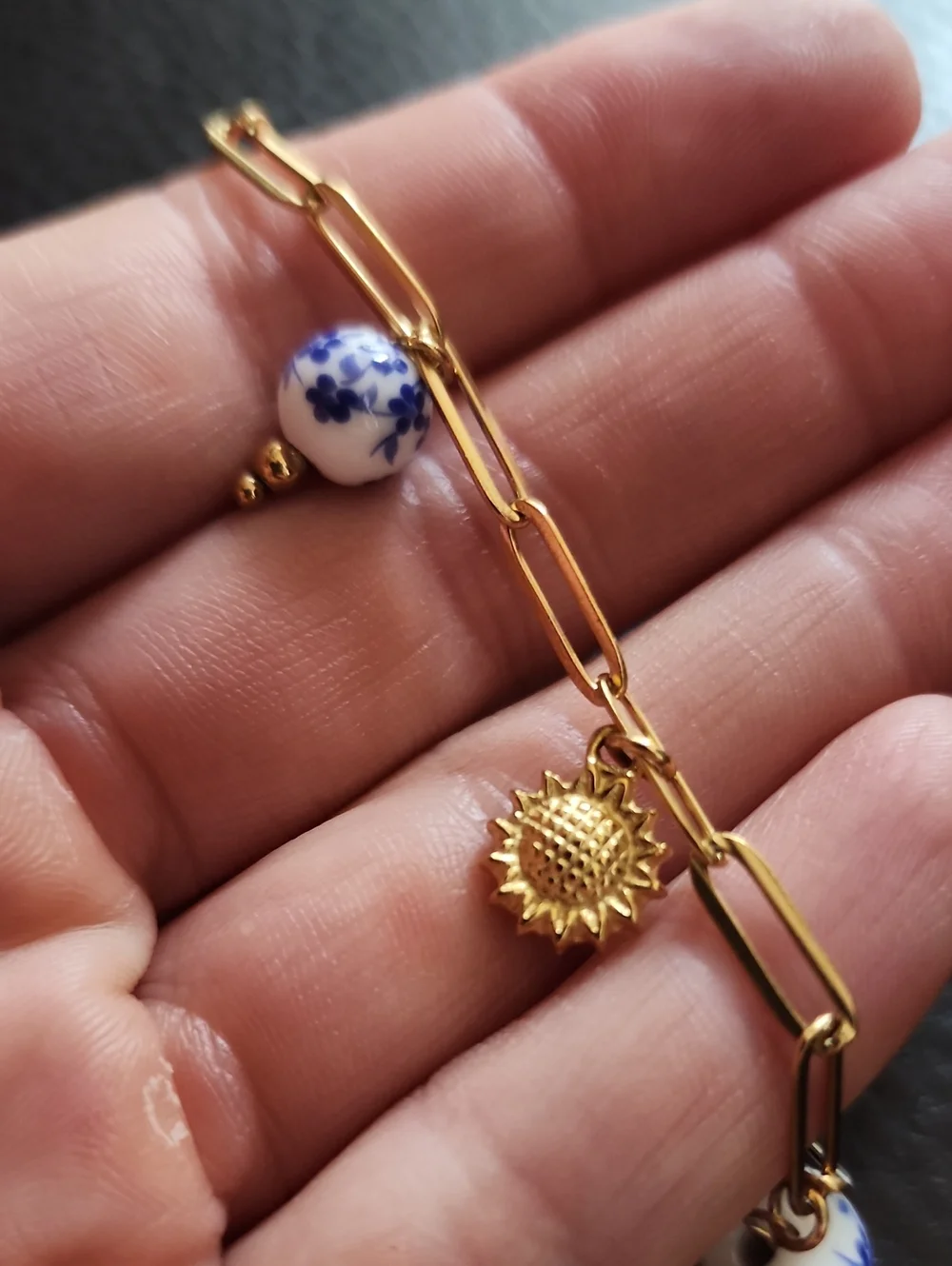 Gold Tone Stainless Steel Chain Bracelet with Blue Floral Porcelain Charms